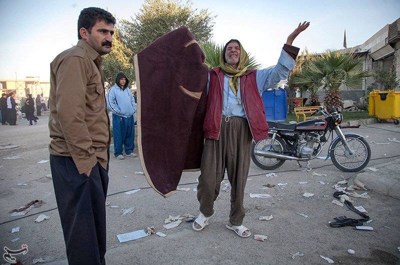 A man reacts following an earthquake in Sarpol-e Zahab county in Kermanshah