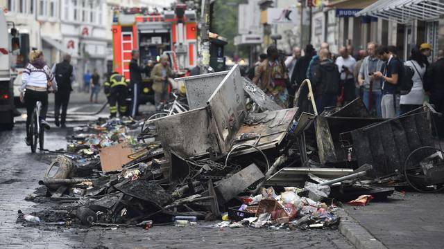 Damages are seen on a street after demonstrations at the G20 summit in Hamburg