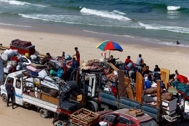 Displaced Palestinians fleeing northern Gaza due to Israeli operation move southward, in Gaza Strip