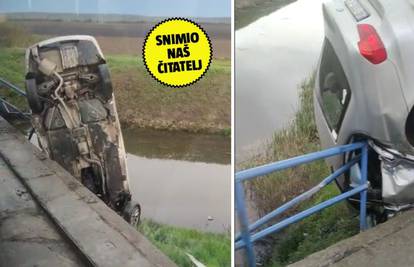 VIDEO Kod Vinkovaca strašan prizor: Sletio s ceste, auto zapeo na mostu, ograda probila staklo