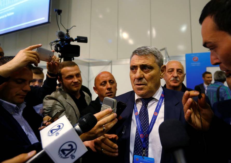 Representative of the Kosovo Soccer Federation Fadil Vokrri speaks to the media after UEFA admitted Kosovo as its newest member during the 40th Ordinary UEFA Congress in Budapest