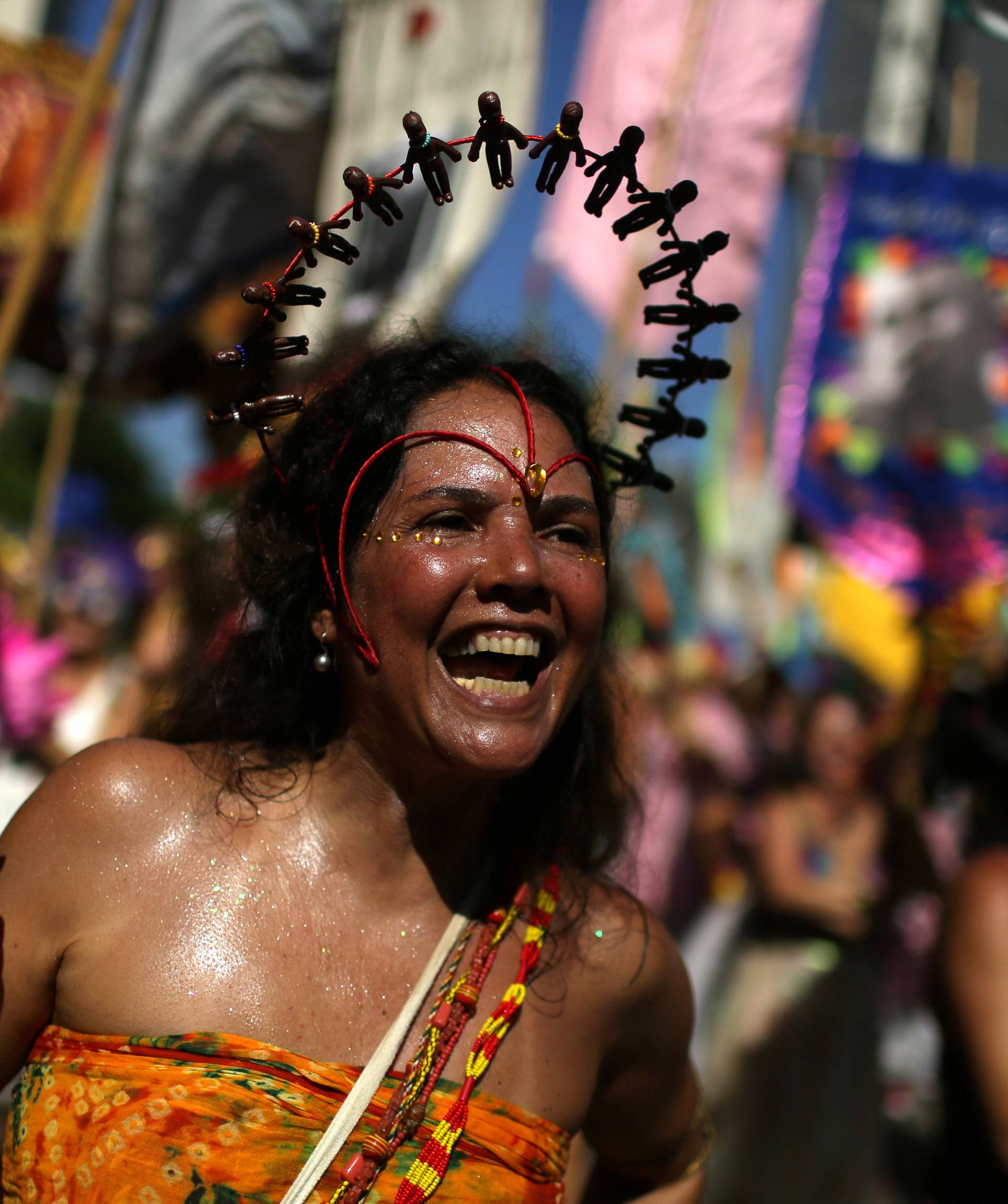 A reveller takes part in the annual block party Cordao de Boitata during pre-carnival festivities in Rio Janeiro