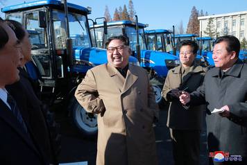 North Korean leader Kim Jong Un gives field guidance to the Kumsong Tractor Factory in this undated picture provided by KCNA