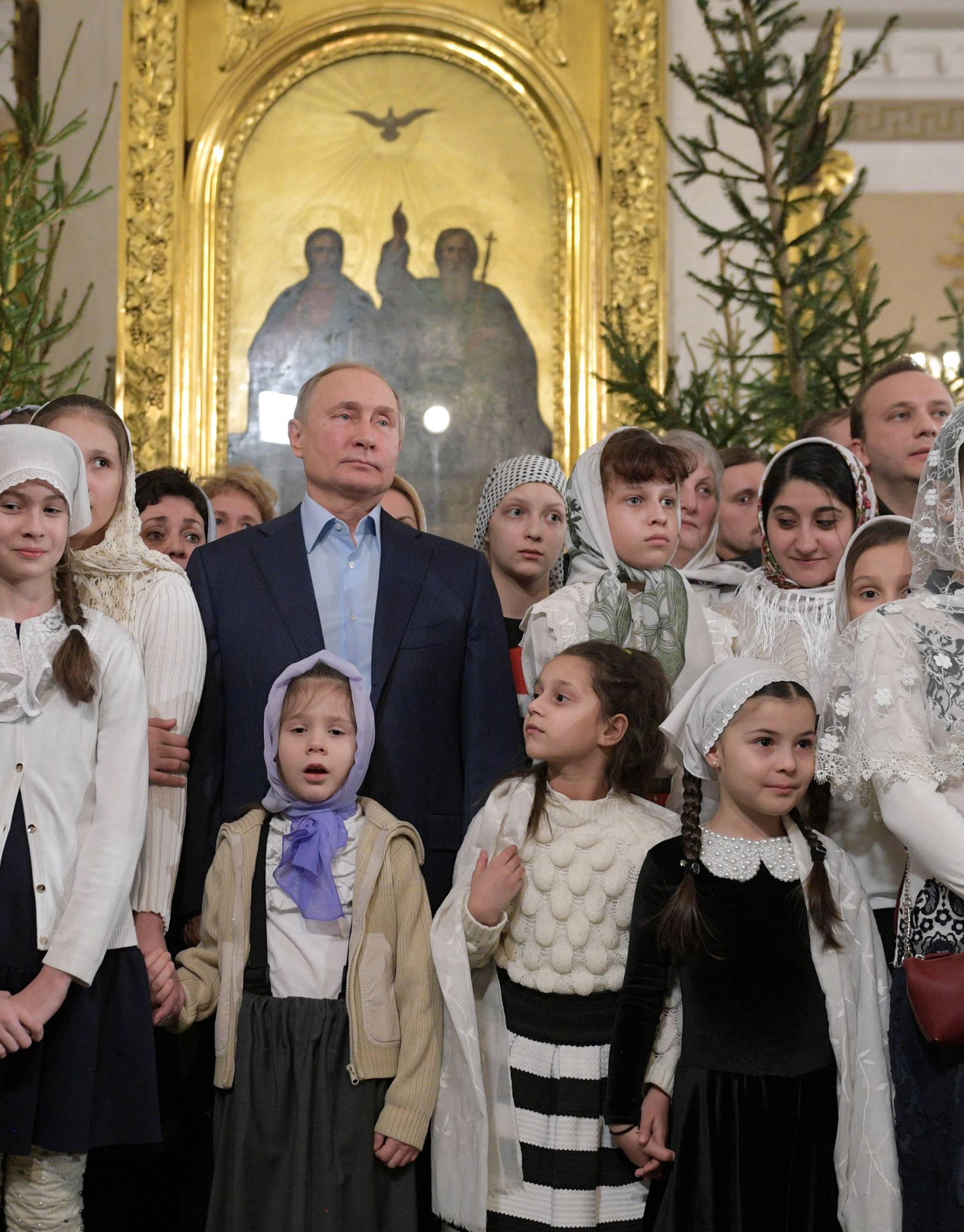 Russian President Putin attends the Orthodox Christmas service in Saint Petersburg