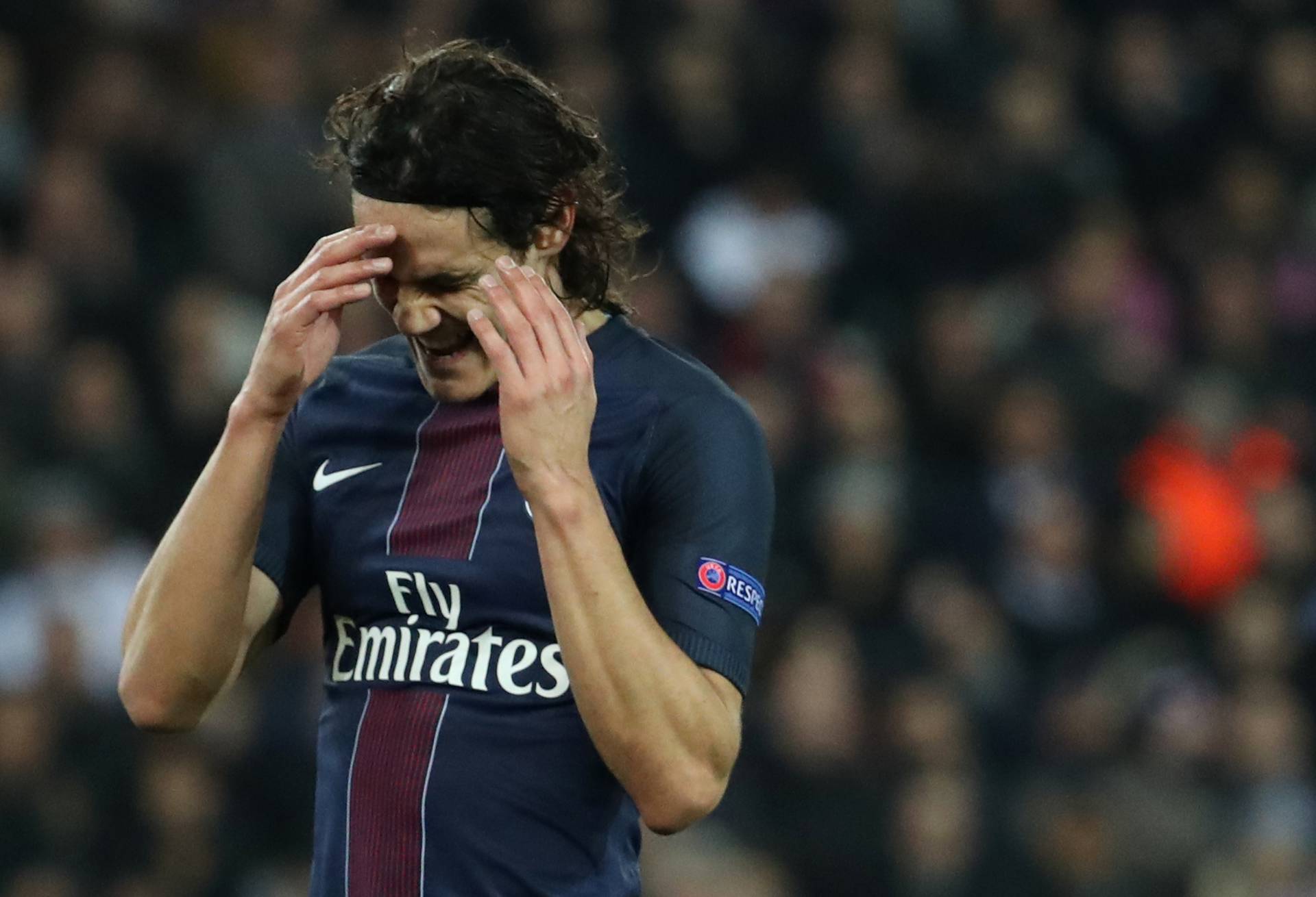 Paris Saint-Germain's Edinson Cavani looks dejected