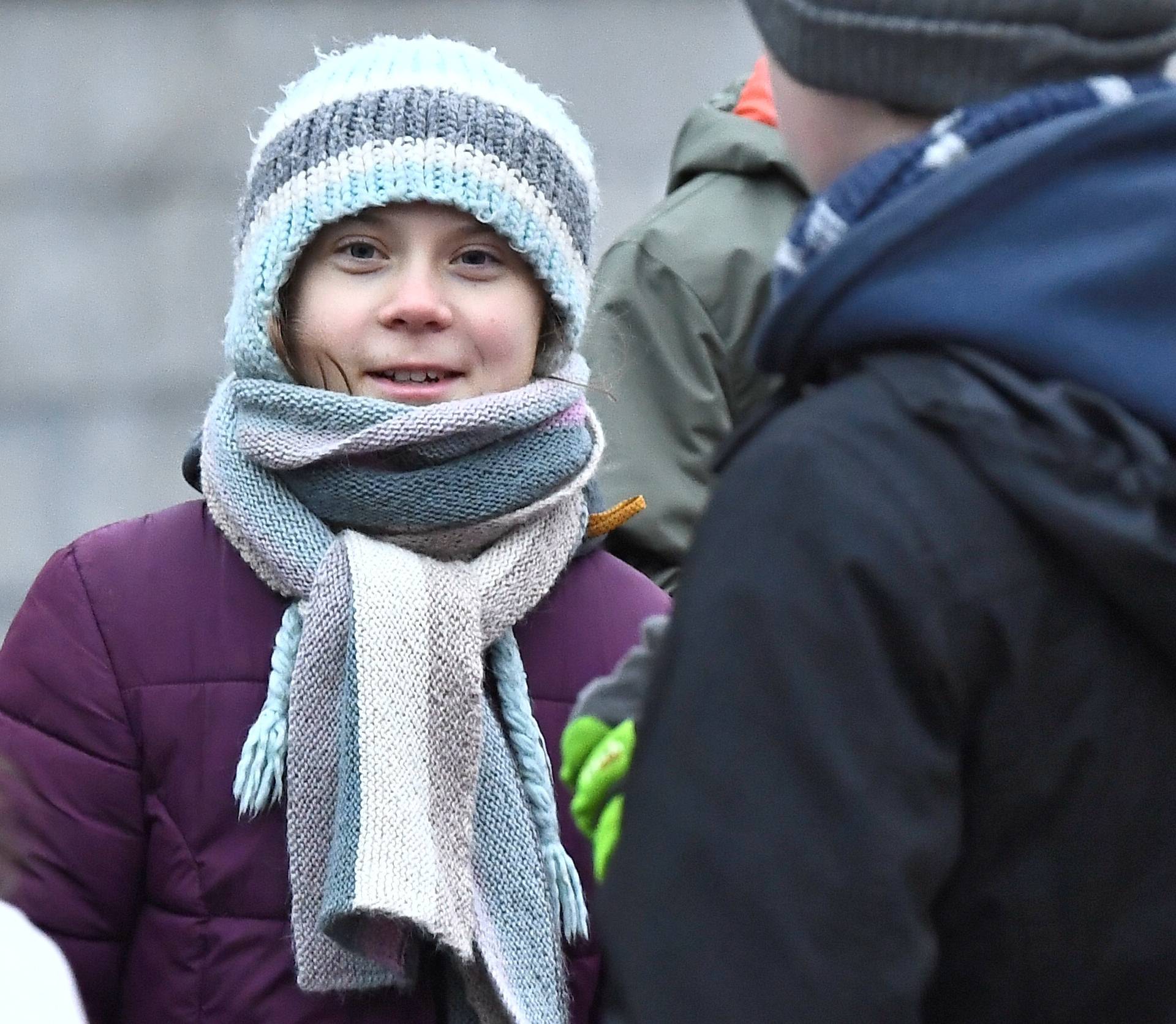 Swedish environmental activist Greta Thunberg celebrates her 17th birthday by attending the weekly "Fridays For Future" climate strike outside the Swedish parliament Riksdagen in Stockholm