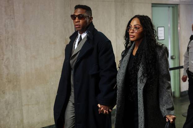 Actor Jonathan Majors arrives with Meagan Good for the jury selection in his assault and harassment case at Manhattan Criminal Court in New York City
