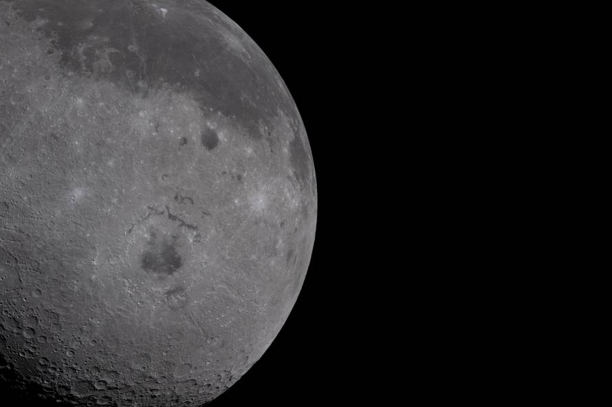 The Moon, with its Orienale basin prominent, is photographed by the Artemis II crew