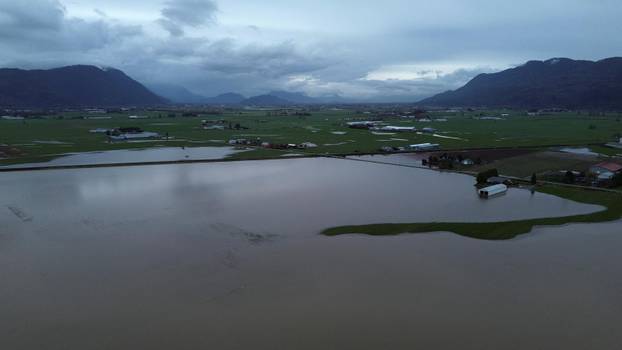 Floodwaters trigger evacuations and highway closures in British Columbia’s Fraser Valley