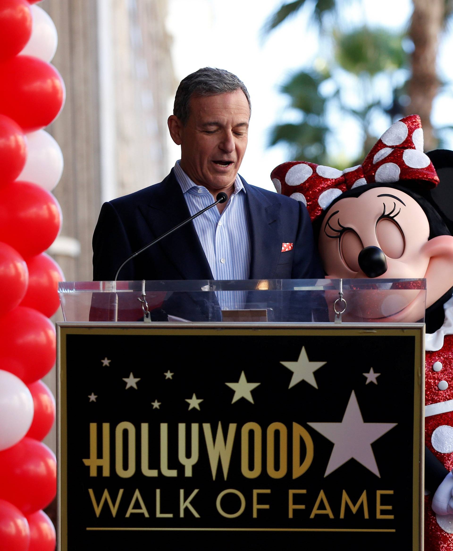 Chairman and CEO of The Walt Disney Company Iger speaks next to the character of Minnie Mouse at the unveiling of her star on the Hollywood Walk of Fame in Los Angeles