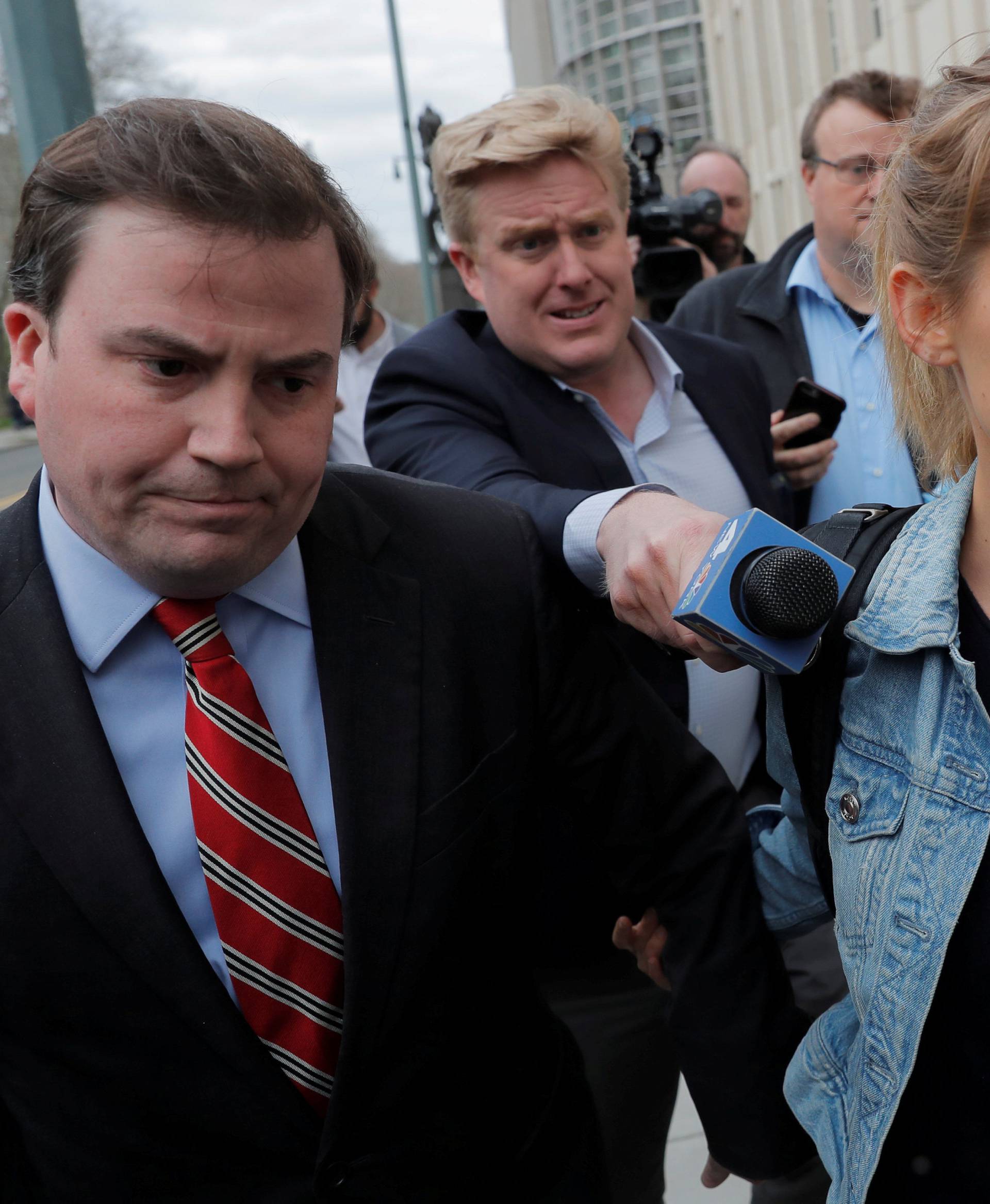 FILE PHOTO: Actress Allison Mack, known for her role in the TV series "Smallville", departs after being granted bail following being charged with sex trafficking and conspiracy in New York