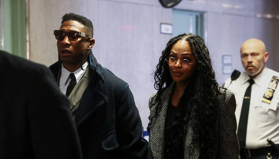 Actor Jonathan Majors arrives with Meagan Good for the jury selection in his  assault and harassment case at Manhattan Criminal Court in New York City