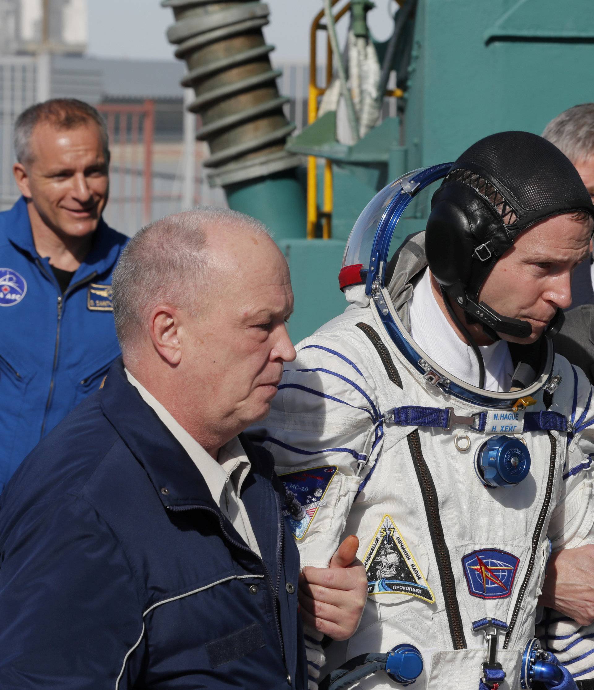 International Space Station (ISS) crew member astronaut Nick Hague of the U.S. walks to board the Soyuz MS-10 spacecraft for the launch at the Baikonur Cosmodrome