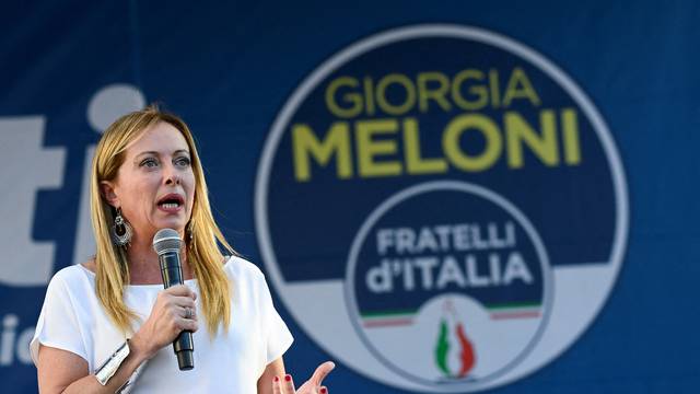 FILE PHOTO: Giorgia Meloni, leader of the far-right Brothers of Italy party, attends a rally in Milan