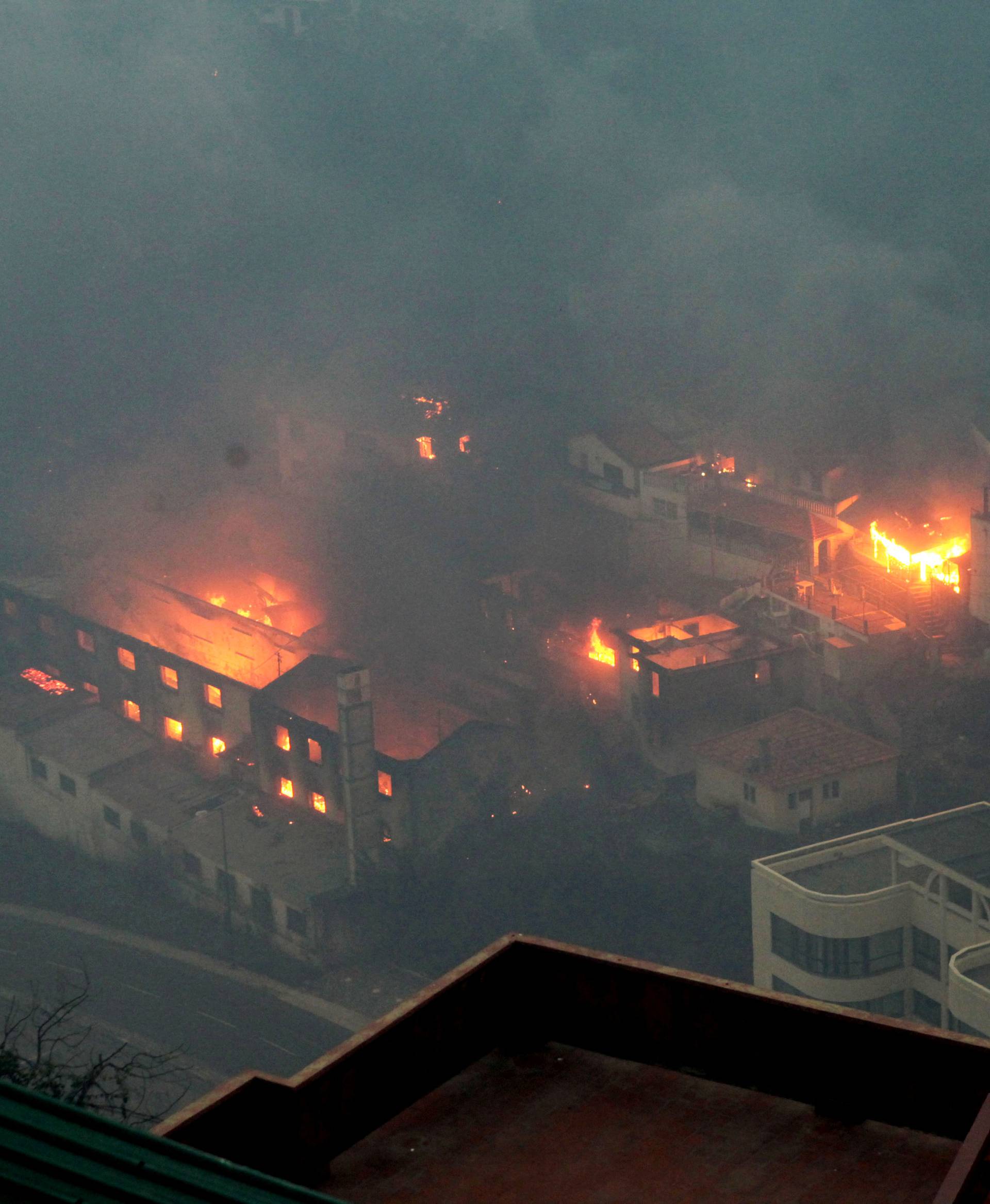 View of Ribeira de Joao Gomes during the wildfires at Funchal, Madeira island