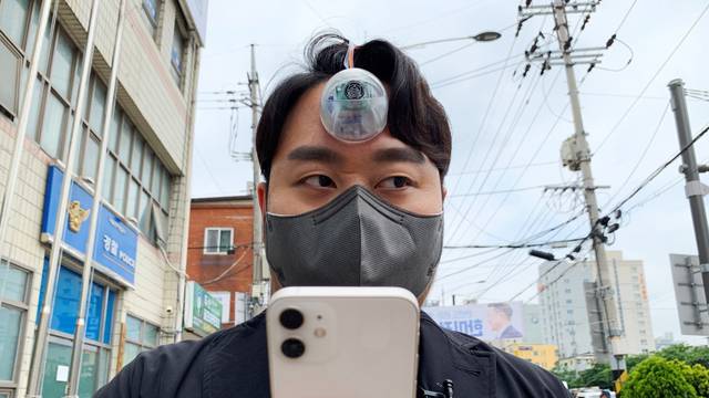 South Korean industrial designer Min-wook showcases the robotic eye, "The Third Eye", in Seoul