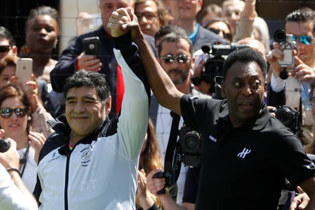 Football legends Pele and Diego Maradona attend an advertising soccer event on the eve of the opening of the UEFA 2016 European Championship in Paris