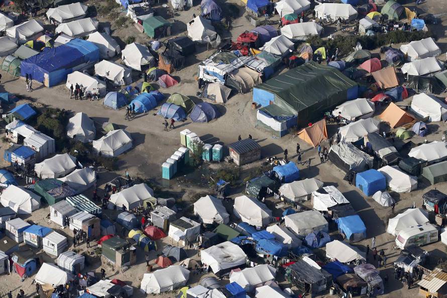 An aerial view shows tents and makeshift shelters on the eve of the evacuation and dismantlement of the camp called the "Jungle" in Calais