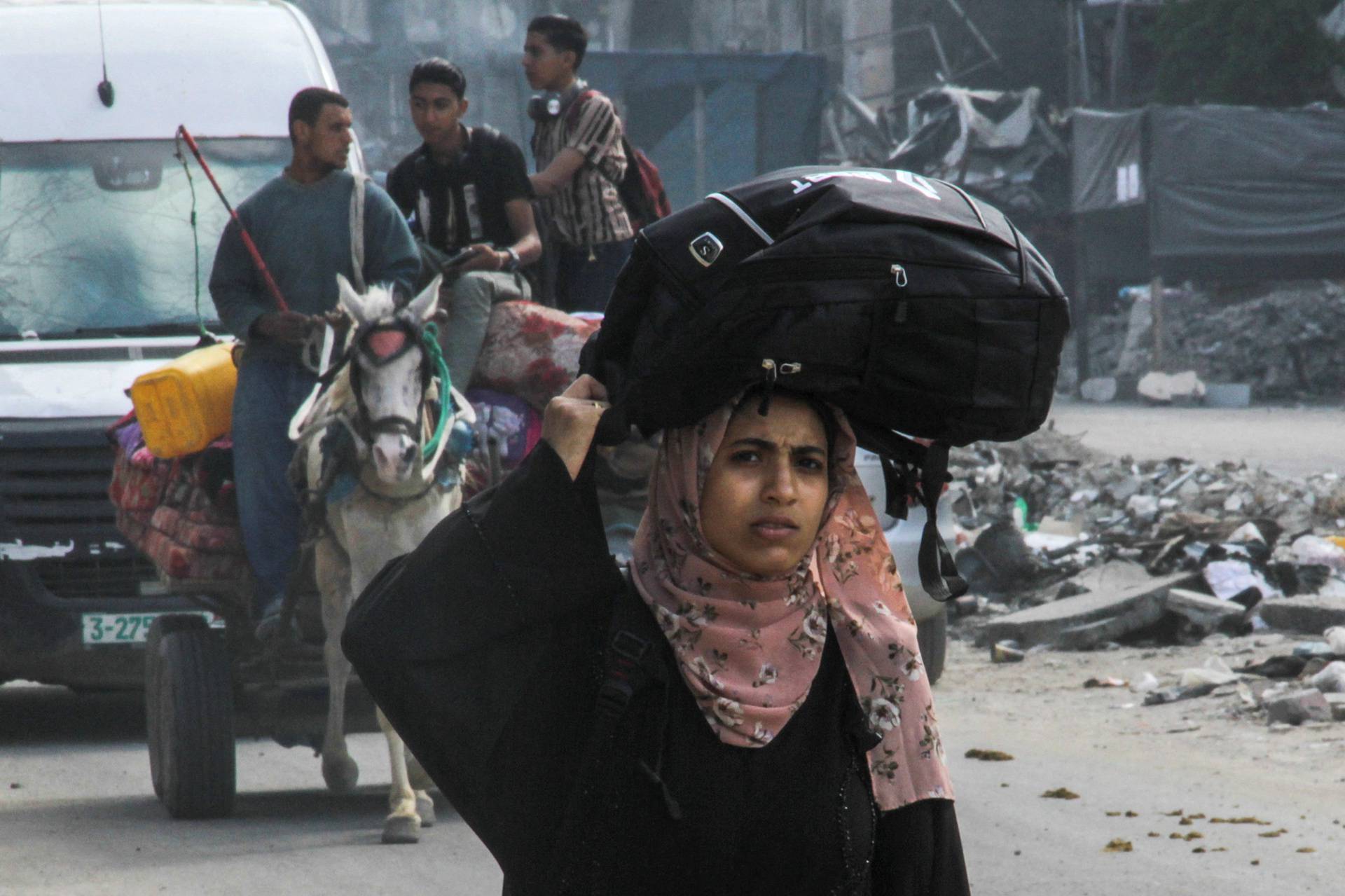 Palestinians flee Jabalia after the Israeli military called on residents to evacuate, in Gaza