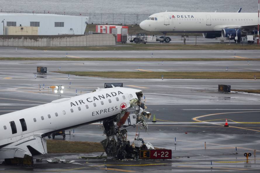 Air Canada Express jet collides with a ground vehicle at LaGuardia airport
