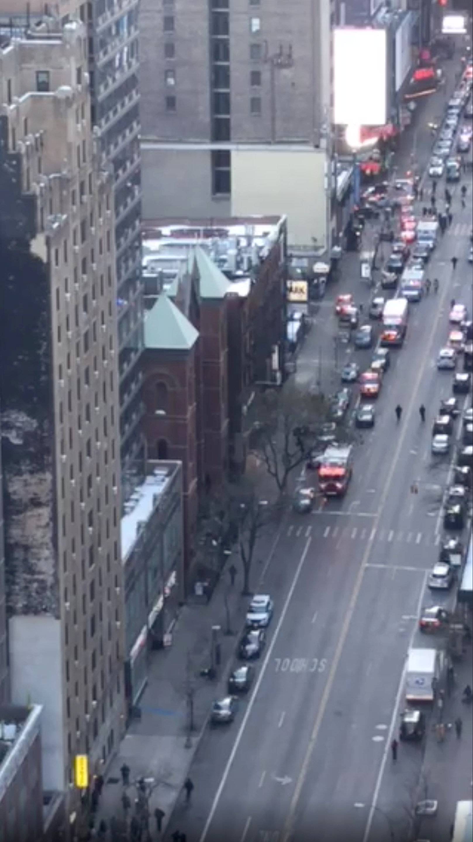 Emergency services are seen on the street following Manhattan explosion in New York
