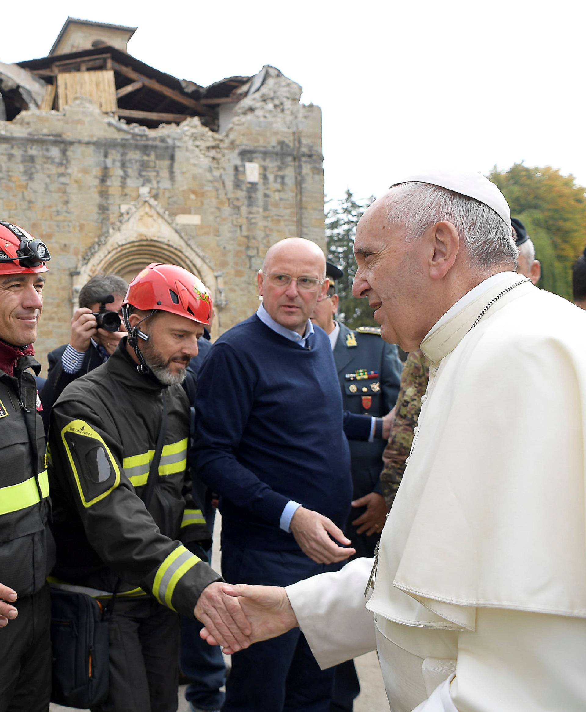 Pope Francis greets firefighters in Amatrice