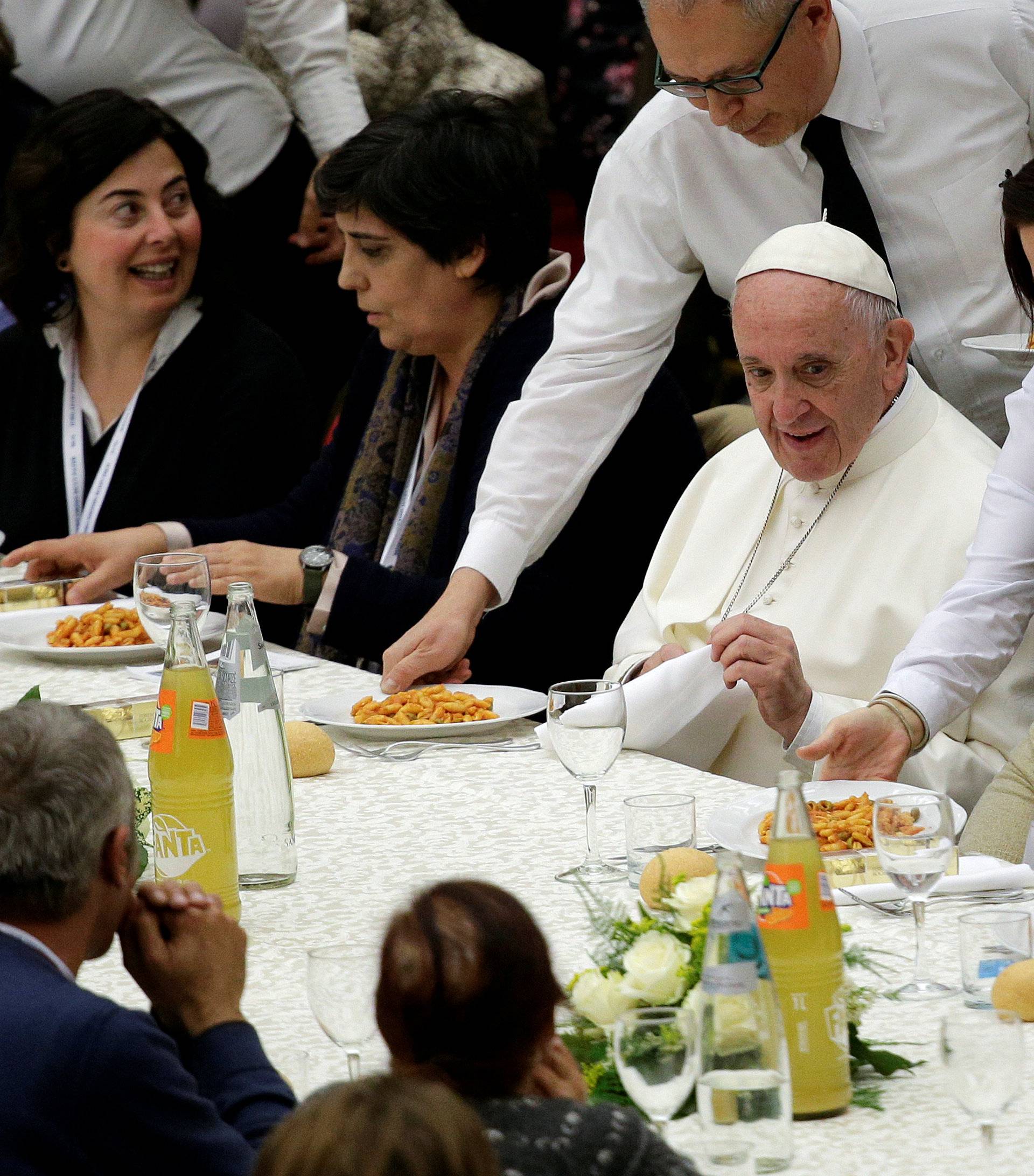 Pope Francis has lunch with the poor following a special mass to mark the new World Day of the Poor in Paul VI's hall at the Vatican