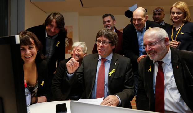 Carles Puigdemont, dismissed President of Catalonia, reacts while viewing results in Catalonia