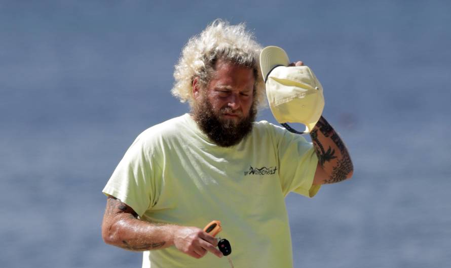 EXCLUSIVE: Shirtless Jonah Hill has his butt grabbed by his girlfriend Sarah Brady while doing yoga on the beach in Hawaii