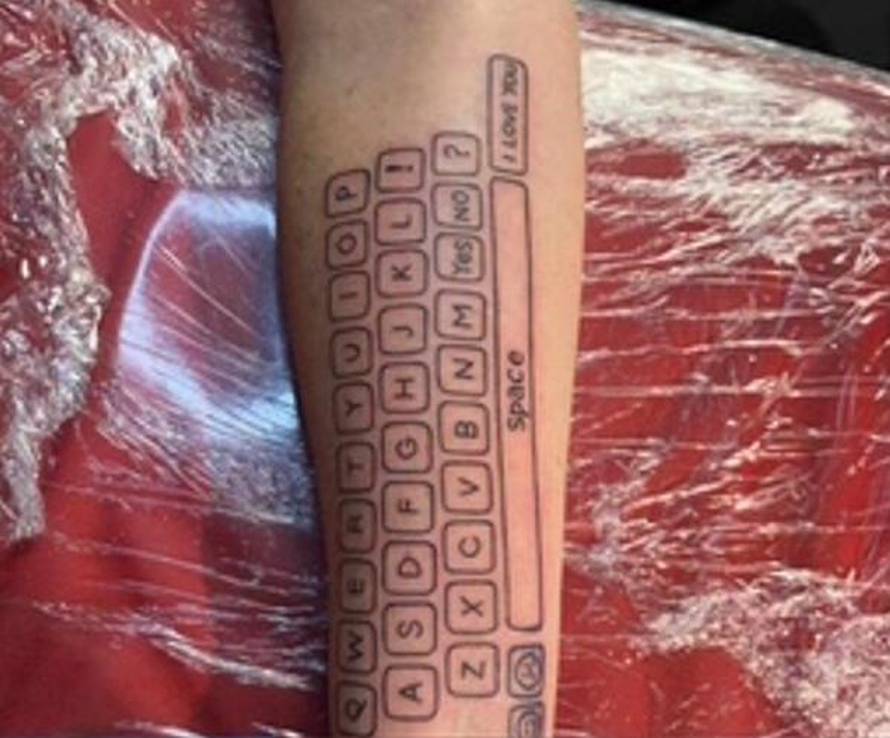 VIDEO: Mum gets KEYBOARD tattooed on arm so non-speaking son can communicate