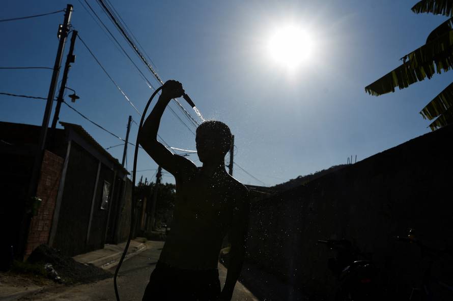 A man cools himself in Rio de Janeiro