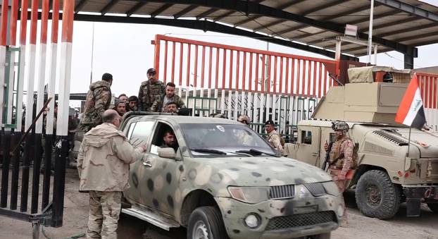 Syrian troops cross into Iraq to seek sanctuary, border town mayor say