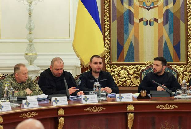 FILE PHOTO: Ukrainian President Zelenskiy and top officials attend a National Security and Defence Council meeting in Kyiv