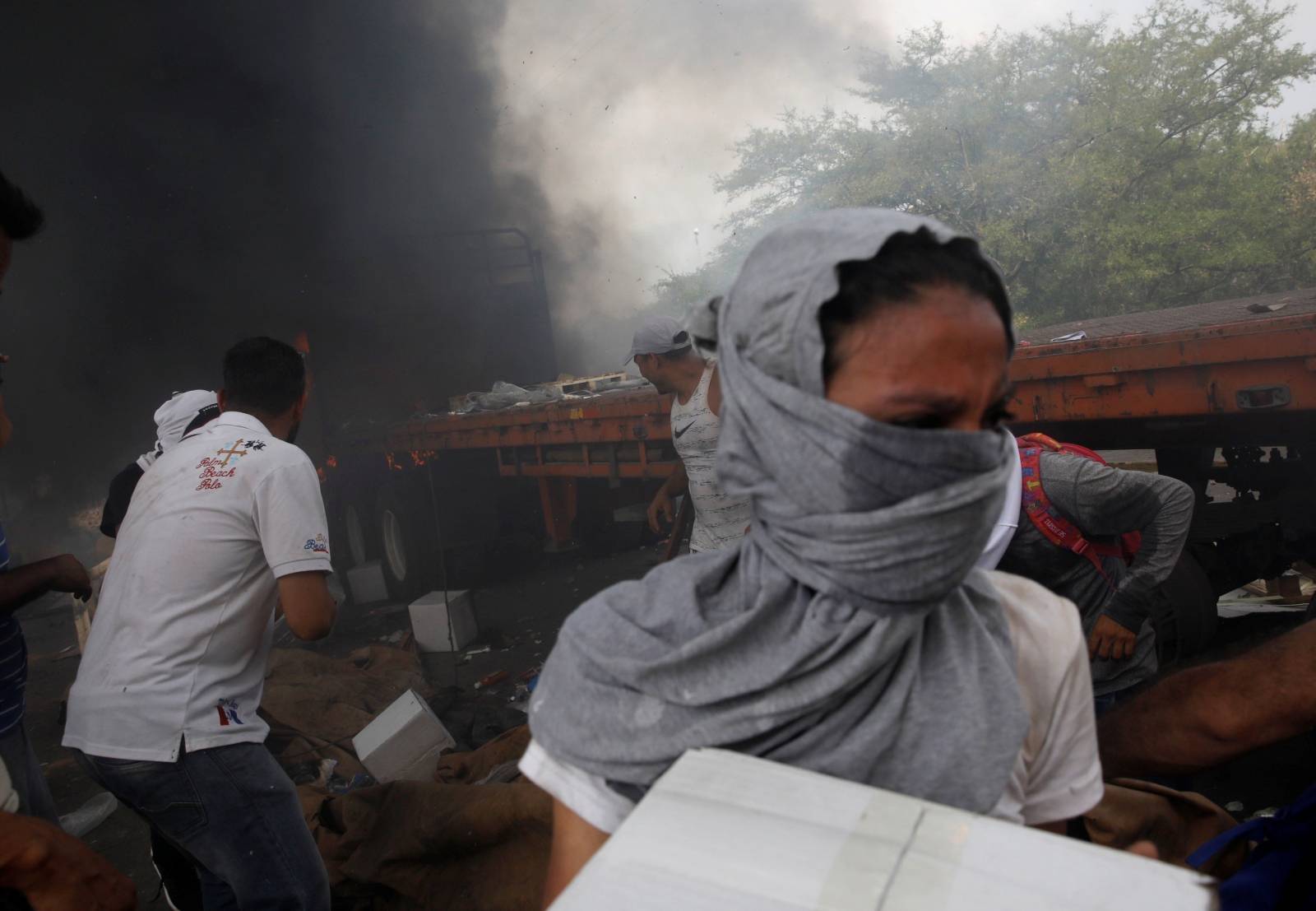 Truck that was carrying humanitarian aid for Venezuela is seen on fire in Cucuta