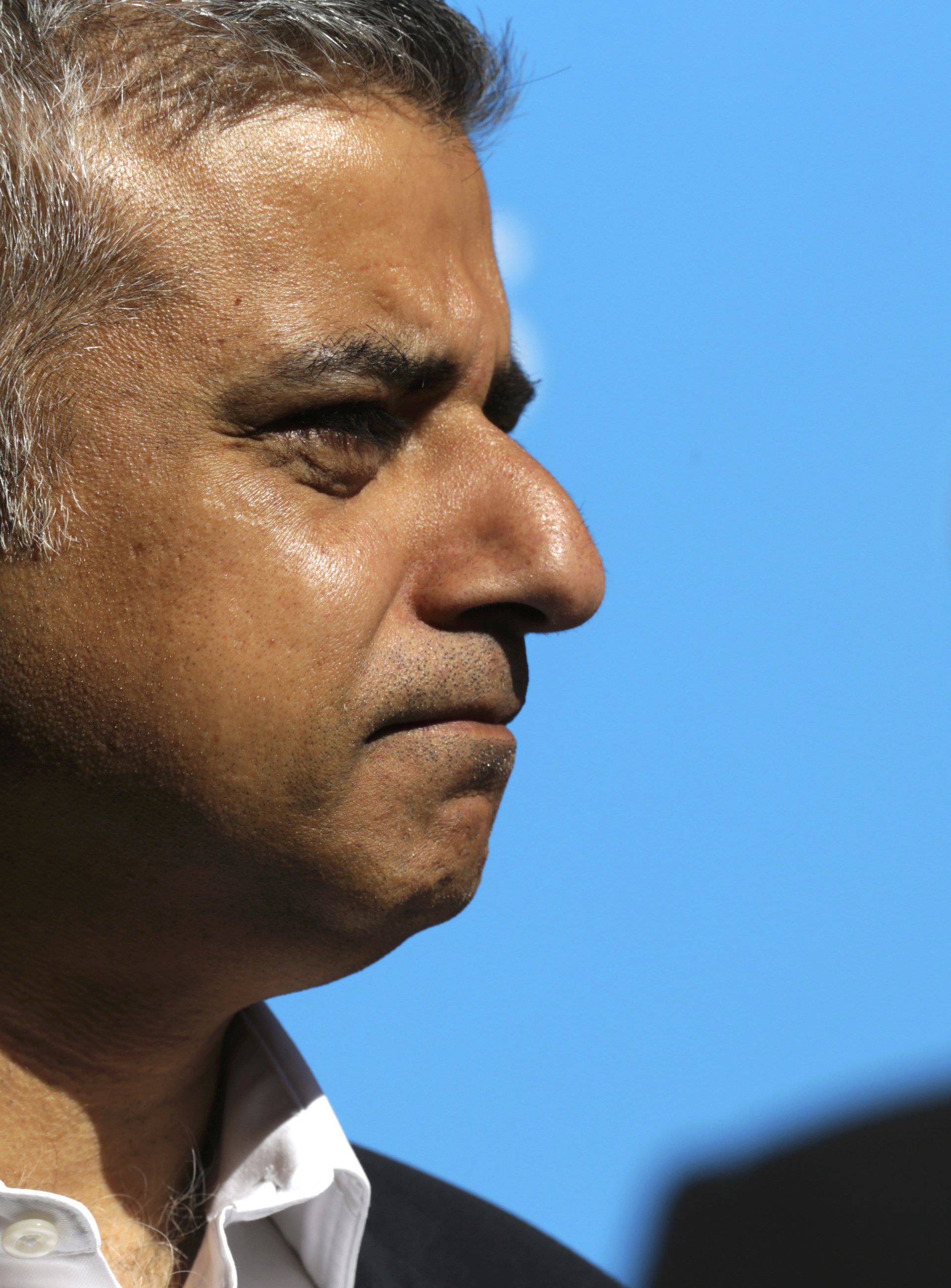 Sadiq Khan, Britain's Labour Party candidate for Mayor of London, speaks to the media at Canary Wharf in London