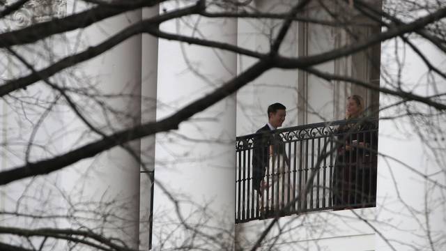Ivanka Trump, her husband, Jared Kushner and their daughter Arabella stand on a balcony of the White House before departure for a church service in Washington, U.S.