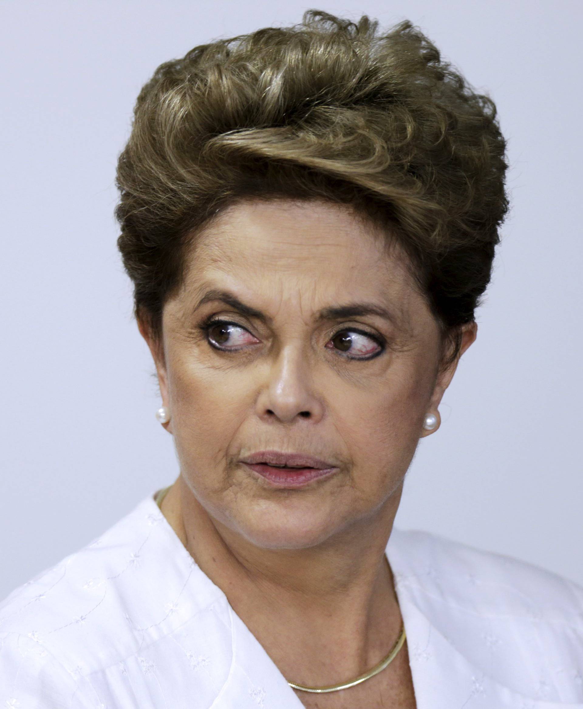 Brazil's President Rousseff looks on during signing of federal land transfer agreement for the government of the state of Amapa at Planalto Palace in Brasilia