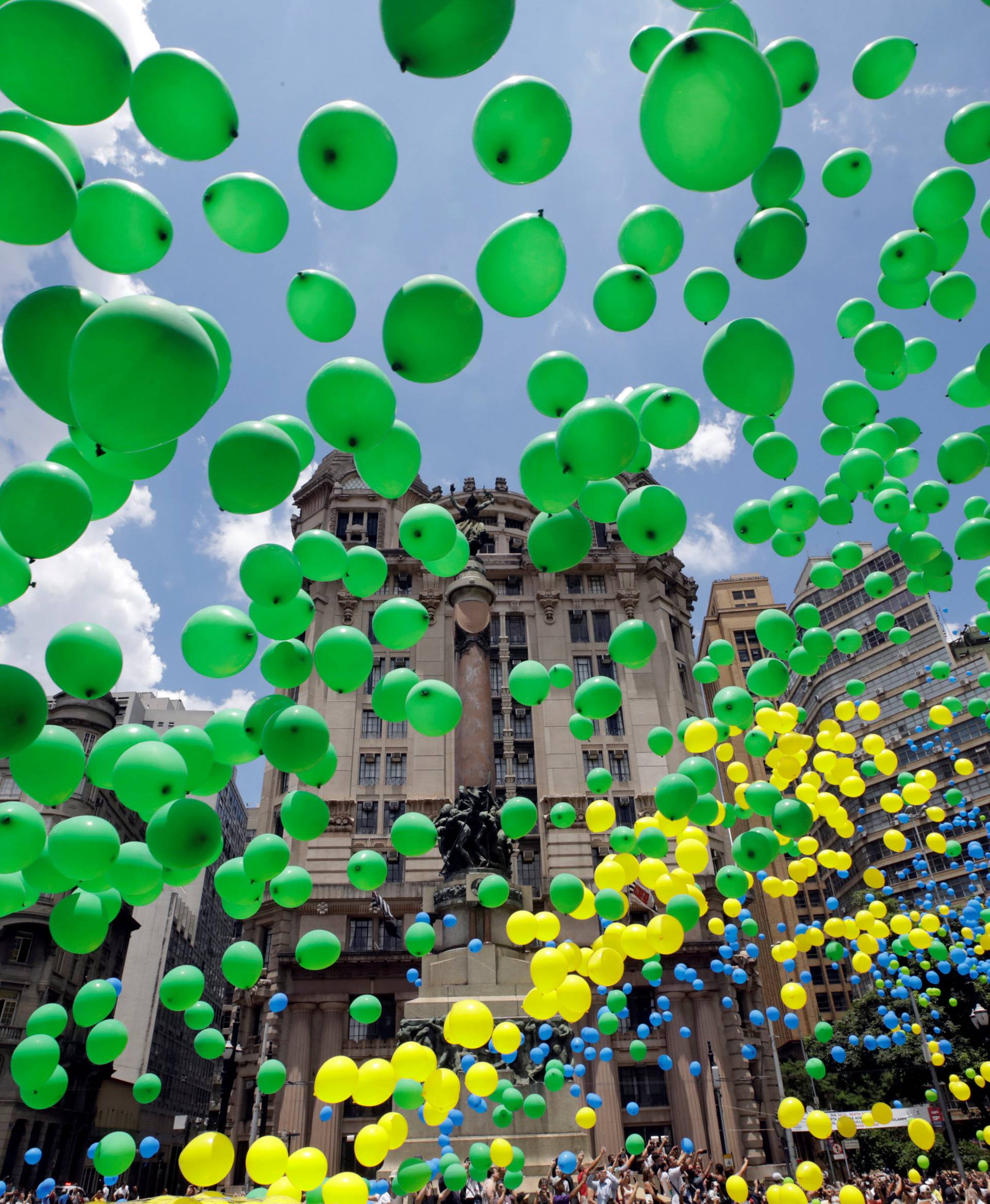 Balloons are released in the sky of downtown Sao Paulo as part of year-end celebrations, Sao Paulo