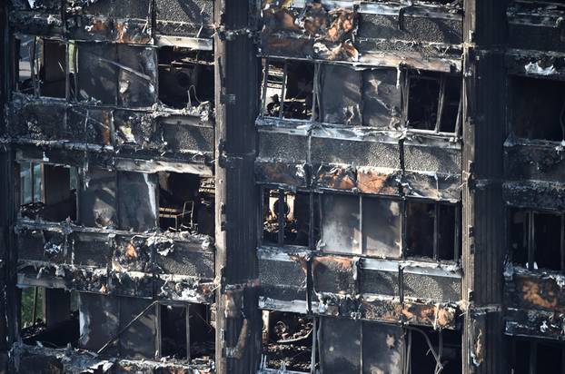 Extensive damage is seen to the Grenfell Tower block which was destroyed in a disastrous fire, in north Kensington, West London