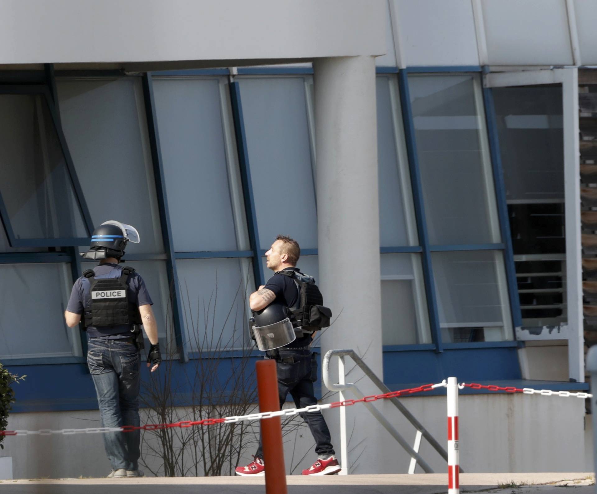 Police inside the Tocqueville high school after a shooting has taken place injuring at least eight people, in Grasse