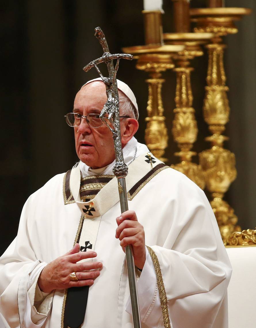 Pope Francis leads the Christmas night Mass in Saint Peter's Basilica at the Vatican