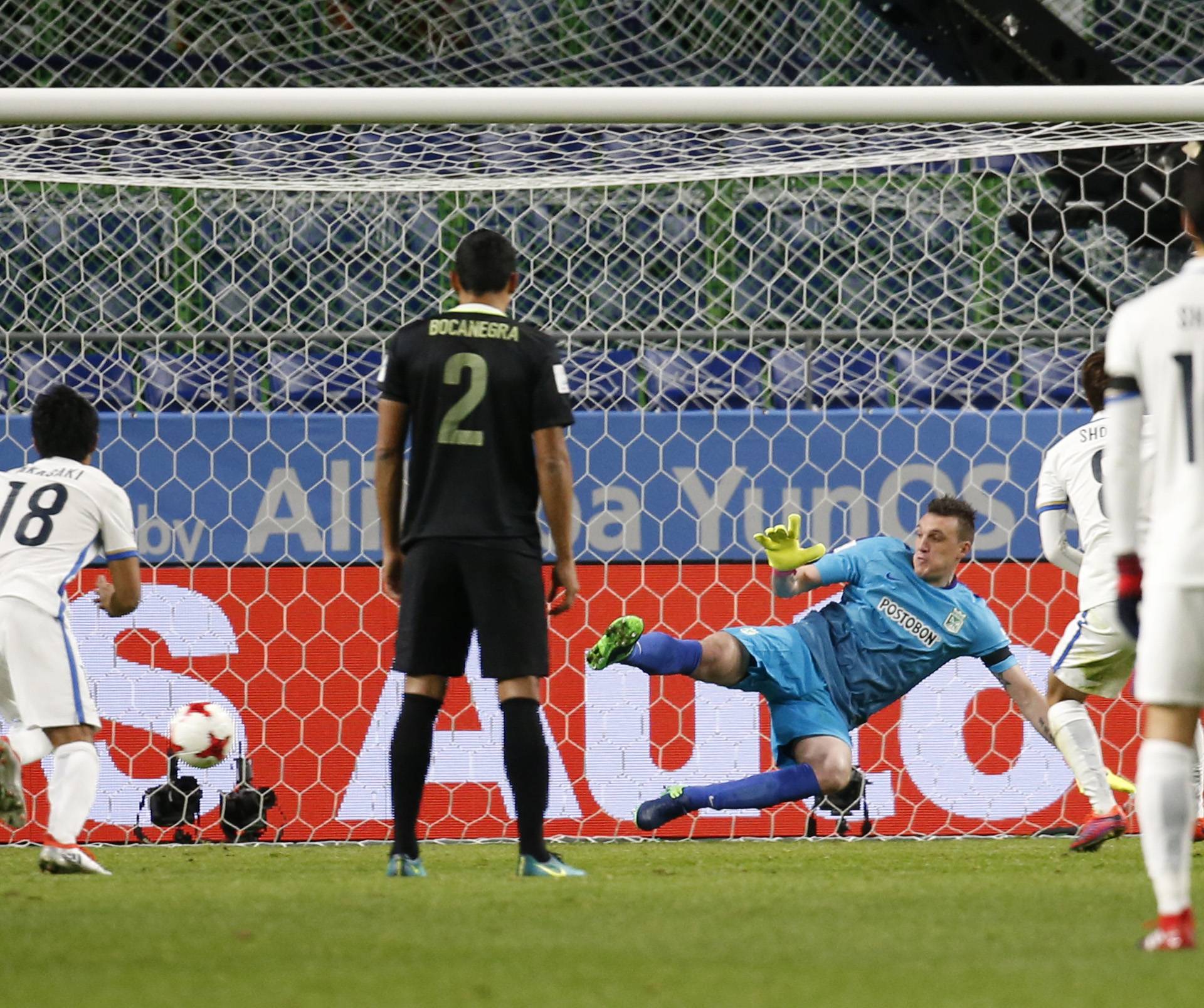 Kashima Antlers' Shouma Doi scores their first goal from the penalty spot