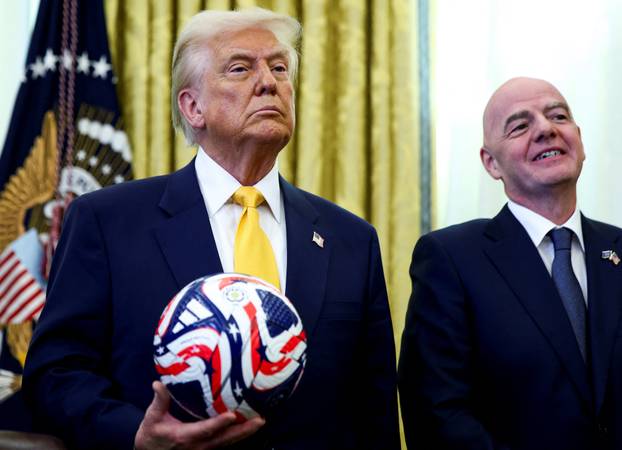 U.S. President Donald Trump stands in the Oval Office of the White House in Washington