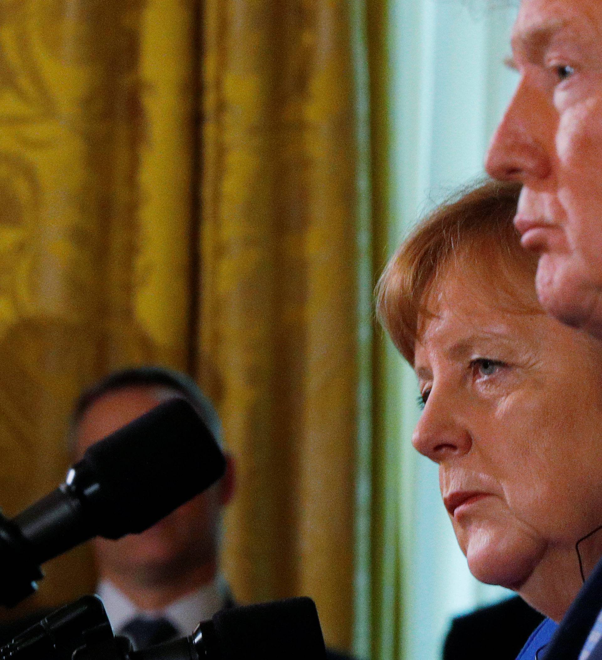 U.S. President Donald Trump and Germany's Chancellor Angela Merkel hold a joint news conference at the White House in Washington