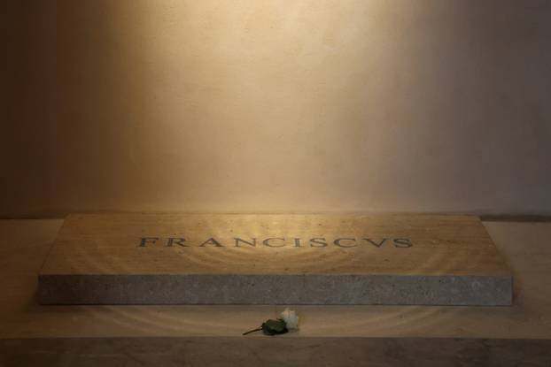 A flower is placed at tomb of the late Pope Francis in the Papal Basilica of Saint Mary Major (Santa Maria Maggiore), in Rome