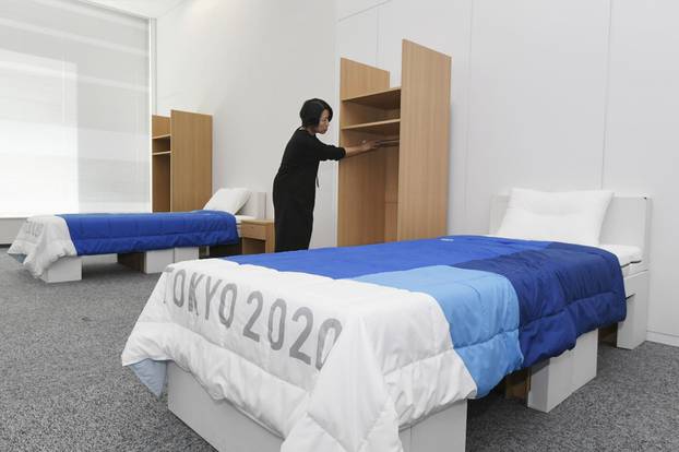 The beds to be used by the athletes at the Tokyo 2020 Olympic and Paralympic Games, made partially from recyclable cardboard, are displayed during a press preview in Tokyo