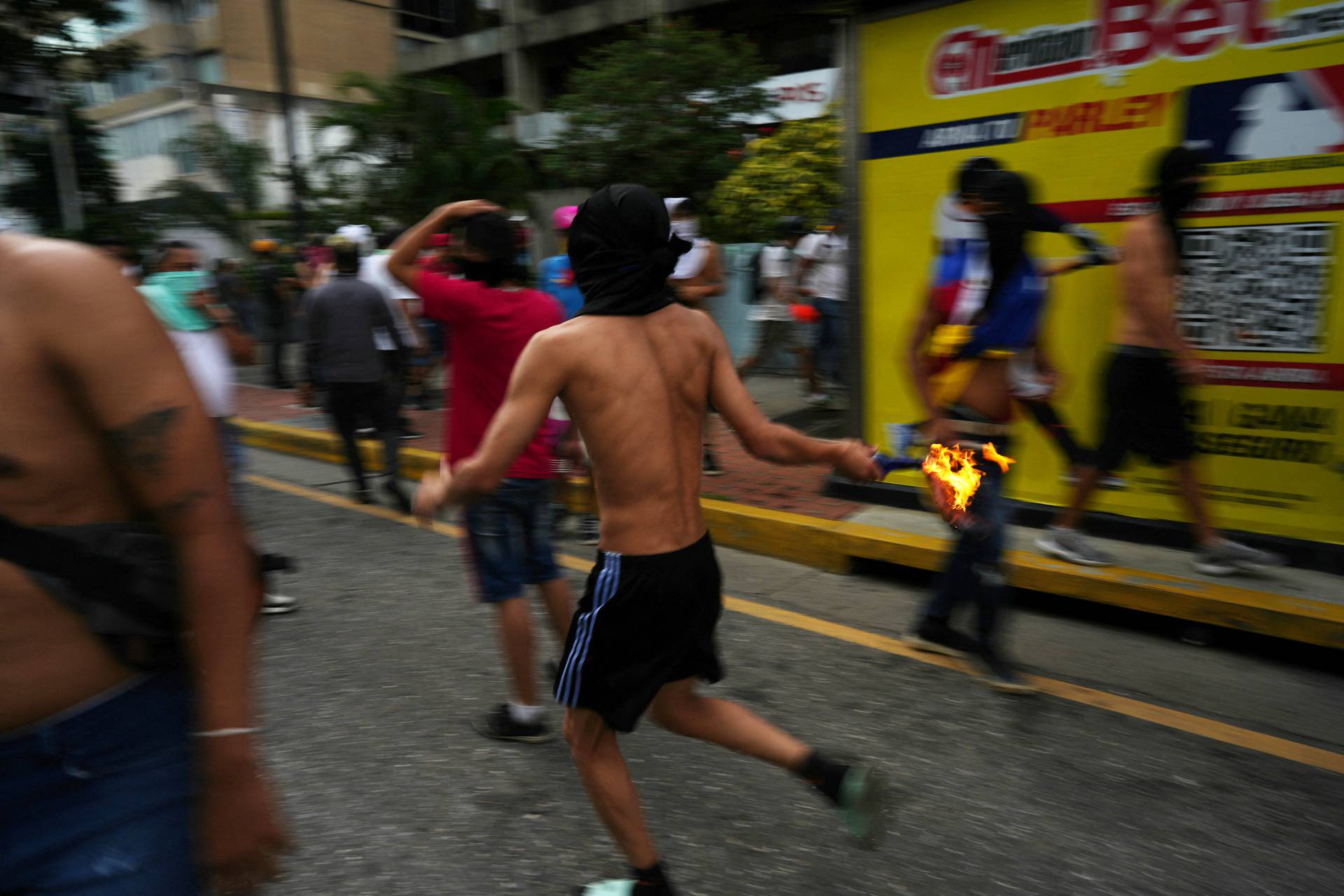 Supporters of the Venezuelan opposition demonstrate following the announcement that Venezuela's President Maduro won the presidential election, in Caracas