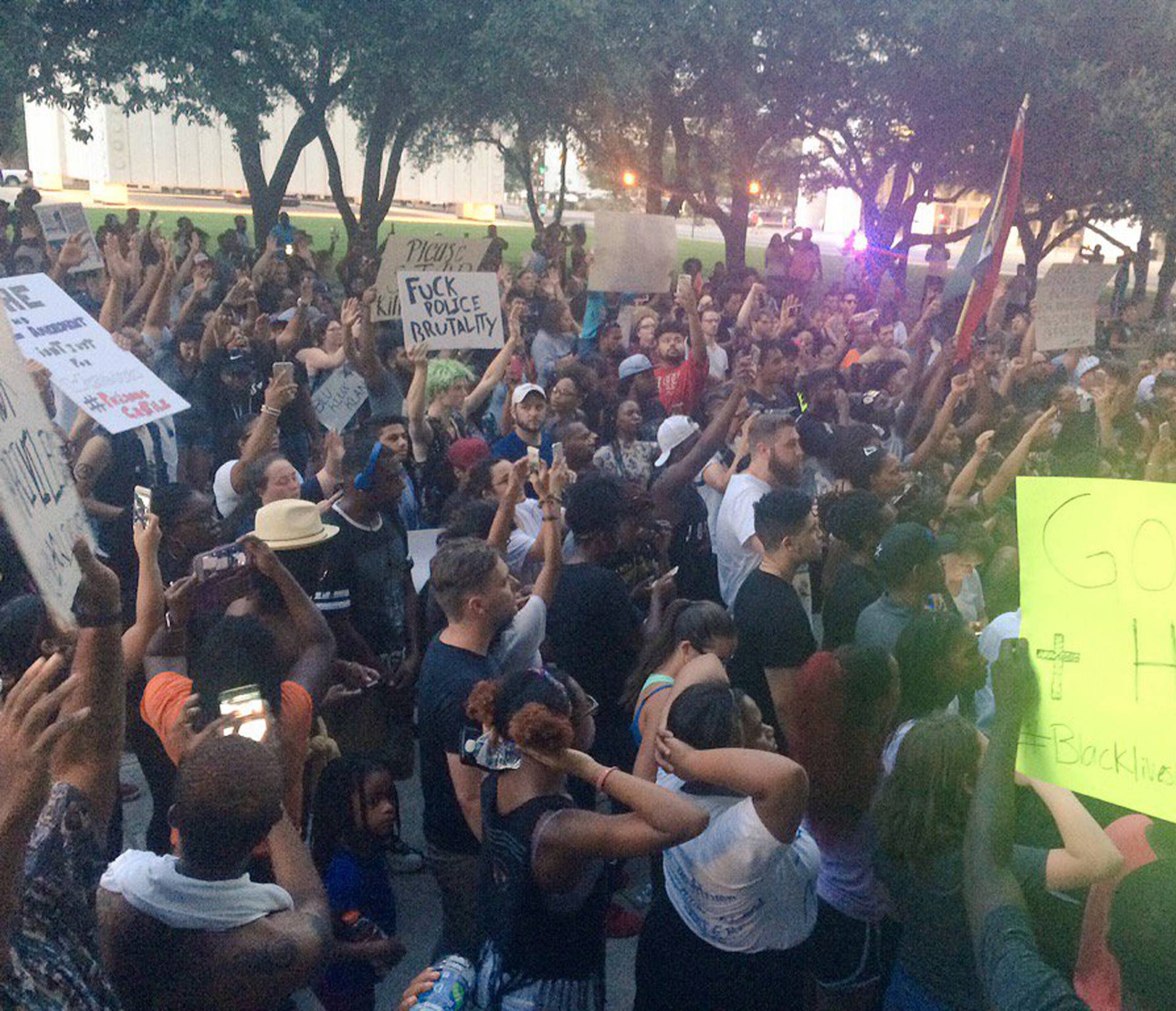 Marchers protest against police shootings of two black men in Louisiana and Minnesota during a demonstration in Dallas