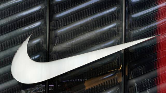 FILE PHOTO: The Nike swoosh logo is seen outside the store on 5th Avenue in New York