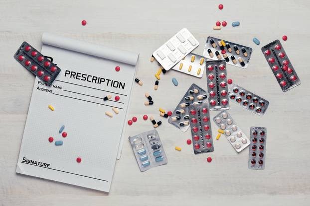 Different Colorful Pills, Tablets, Capsules And Prescription On 